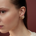 Noble küpe minimalist tasarım yan profil pırlanta detay