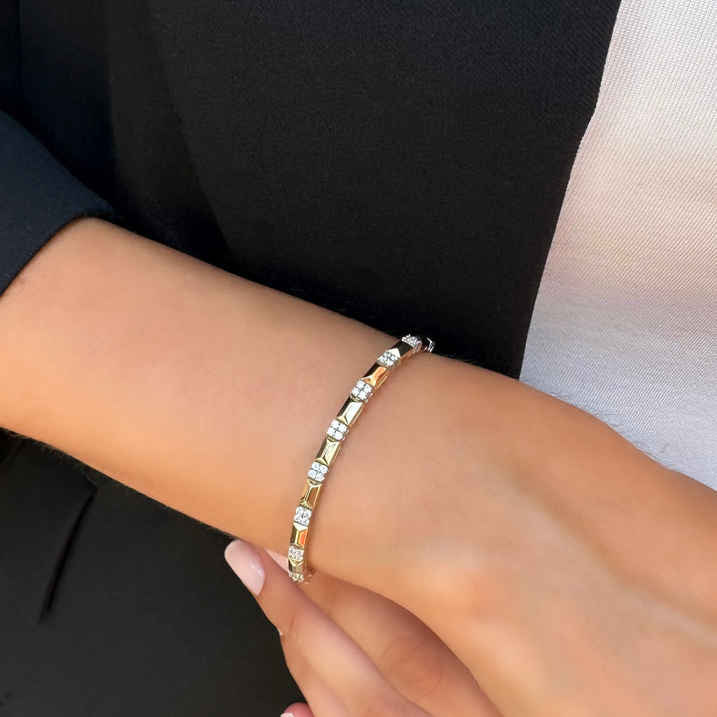 Cubella pırlanta bileklik kolda görünümü, 14K altın üzerinde parlak pırlanta dizilimi