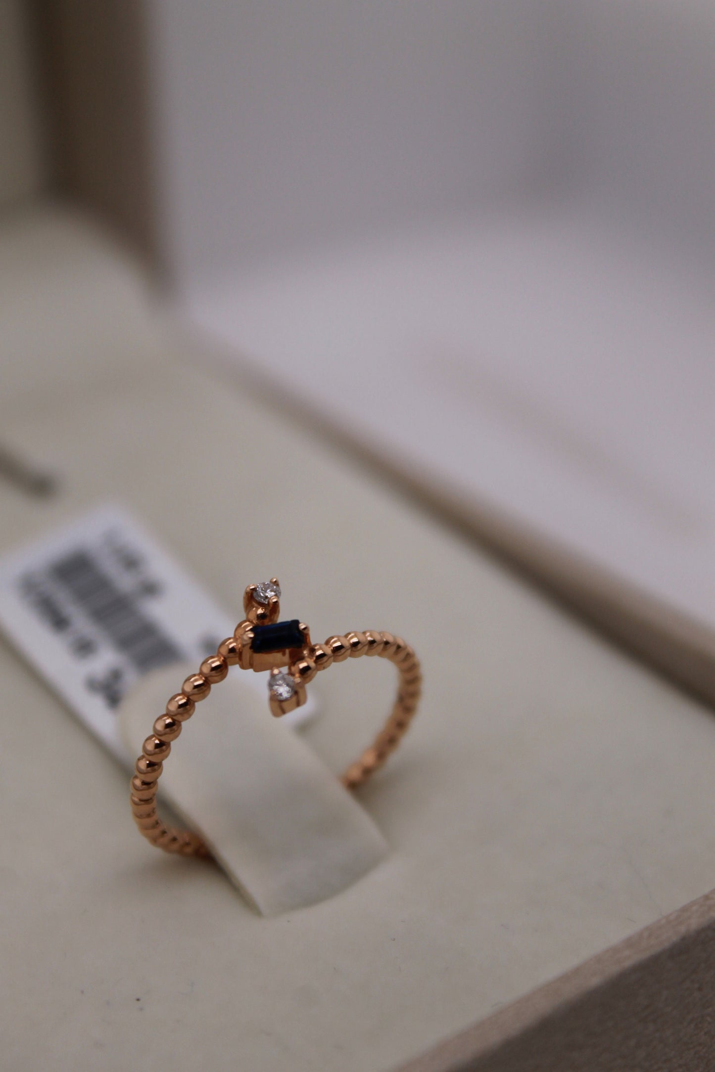 Cross Baguette Sapphire and Round Diamond Ring
