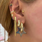 Turquoise Eye Piercing